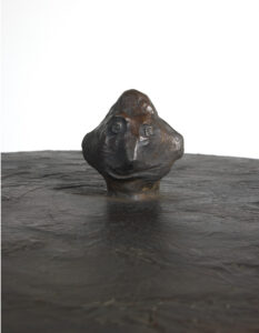 Back close up of the Him side table by Elizabeth Garouste, in brown patinated bronze 
