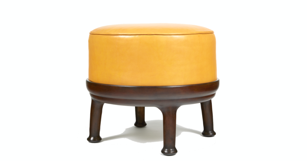 Eric Schmitt, low stool with a round shape, seat in yellow leather and base in brown bronze