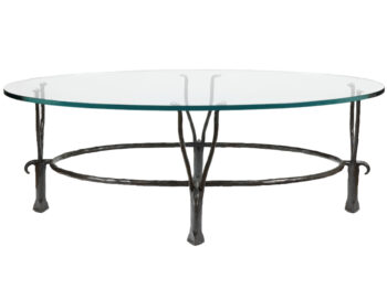 Designed by garouste Bonetti, low oval table, legs in black wrought iron and top in glass