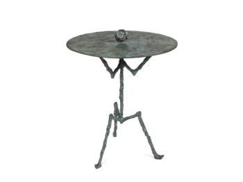Elizabeth Garouste, sculptural green bronze side table with 3 legs and a round top with a smiling woman's face on the center