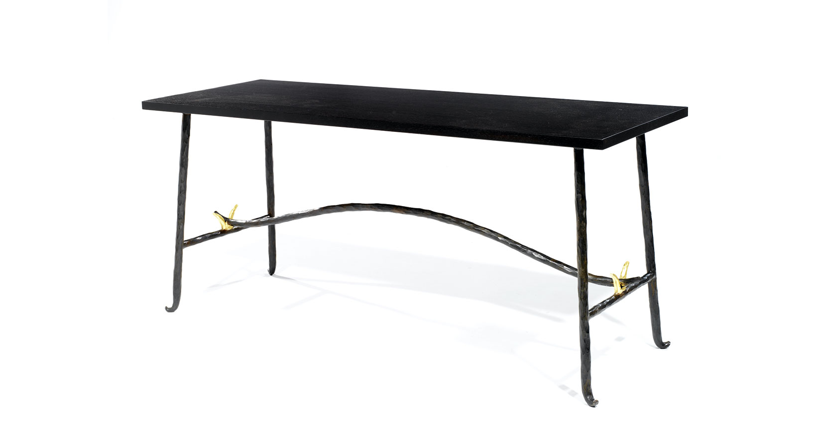 Garouste Bonetti, minimalist low table, black wrought iron legs slightly curved at the bottom, with two small golden ornaments with the shape of V, dark brown wooden top
