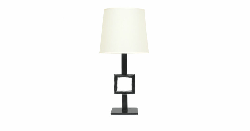 Elizabeth Garouste, minimalist lamp produced by a master craftsman in a limited edition, with a square base from which starts a black thick stick in wrought iron with a square in the middle, white lampshade