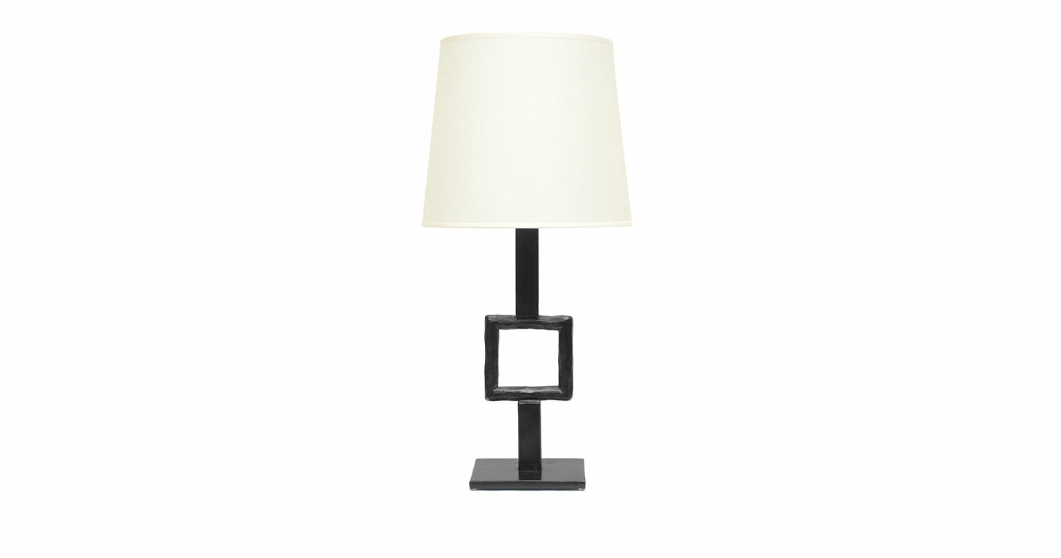 Elizabeth Garouste, minimalist lamp produced by a master craftsman in a limited edition, with a square base from which starts a black thick stick in wrought iron with a square in the middle, white lampshade