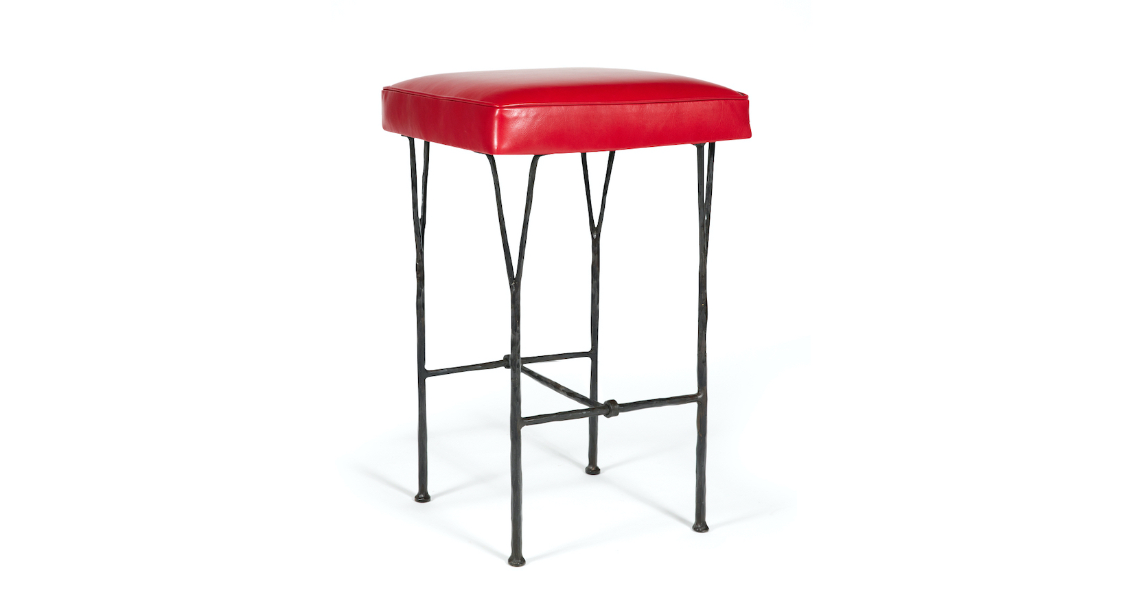 Garouste Bonetti, minimalist high bar stool with black wrought iron legs that split upwards into forks that support the upholstered red leather seat