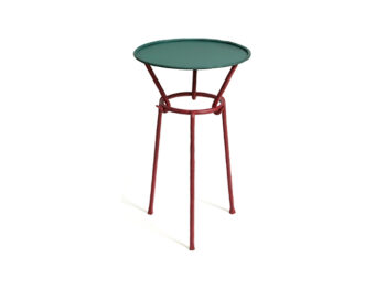 new creation 2025 by Mattia Bonetti, artistic side table with 3 legs in red patina wrought iron and round top in green patinated metal, produced by the ironsmith of Diego Giacometti