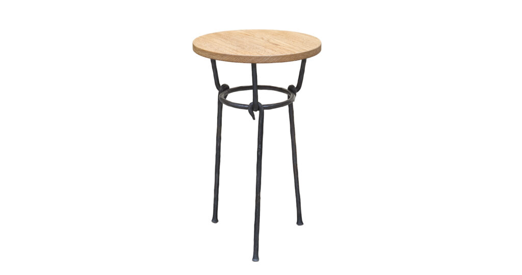 2026, new creation Mattia Bonetti, Traviata pedestal table with round oak top and 3 black wrought iron legs, produced by the ironsmith of Diego Giacometti
