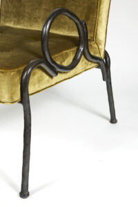 CLOSE UP OF THE RAVELLO ARMCHAIR DESIGNED BY ERIC SCHMITT