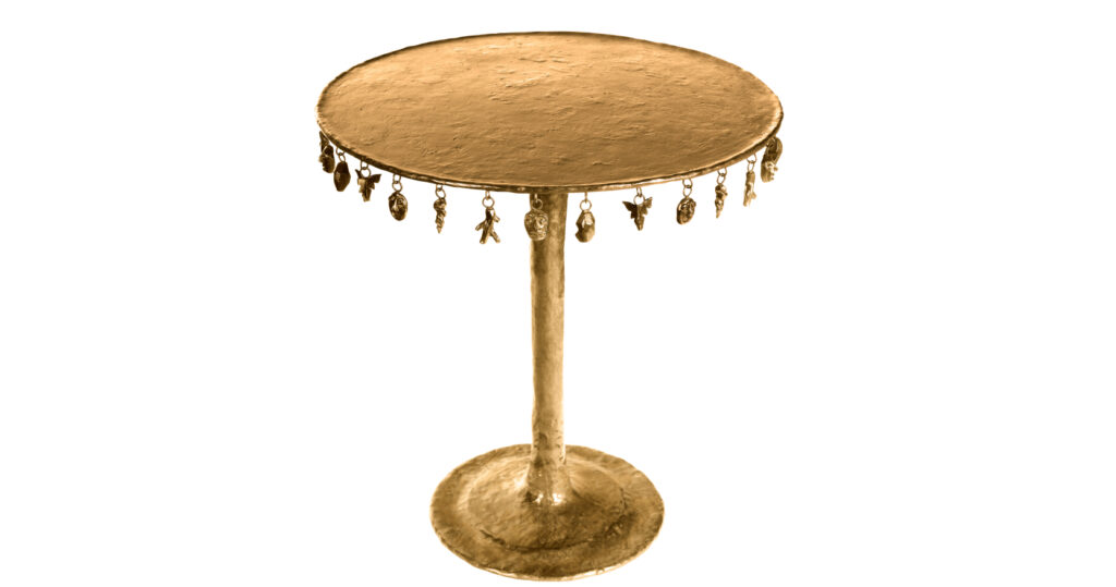 2025 creation of luxury design by Mattia Bonetti, baroque side table in golden bronze with round central leg, round top with hanging figurines, limited edition of 12 numbered copies