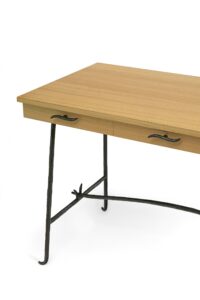 Close-up of the Asturias desk by Garouste and Bonetti, featuring an oak top and brown wrought-iron legs—custom-made by Diego Giacometti’s ironworker.